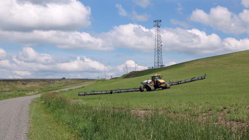 To provide cell phone services in rural areas between larger towns telecommunication companies install towers on hilltops or high ridges in rural areas. This tower is in rural Whitman County Washington adjacent to where a farmer is growing a crop. (Photo by: Don and Melinda Crawford/UCG/Universal Images Group via Getty Images)