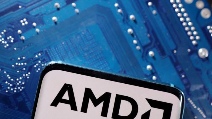 FILE PHOTO: A smartphone with a displayed AMD logo is placed on a computer motherboard in this illustration taken March 6, 2023. REUTERS/Dado Ruvic/Illustration/File Photo