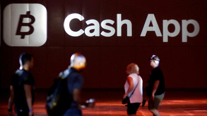 FILE PHOTO: The logo of Cash App is seen at the main hall during the Bitcoin Conference 2022 in Miami Beach, Florida, U.S. April 6, 2022. REUTERS/Marco Bello/File Photo