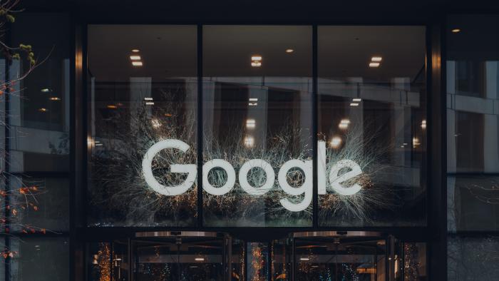 London, UK - January 01, 2022: Name sign above the entrance of Google offices in London. First Google office in the UK in opened in 2003 and has since grown to accommodate thousands of employees.