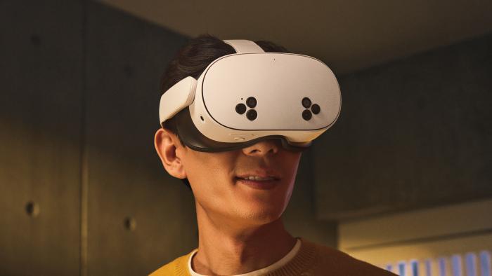 A man wearing the Meta Quest 3S virtual reality headset.